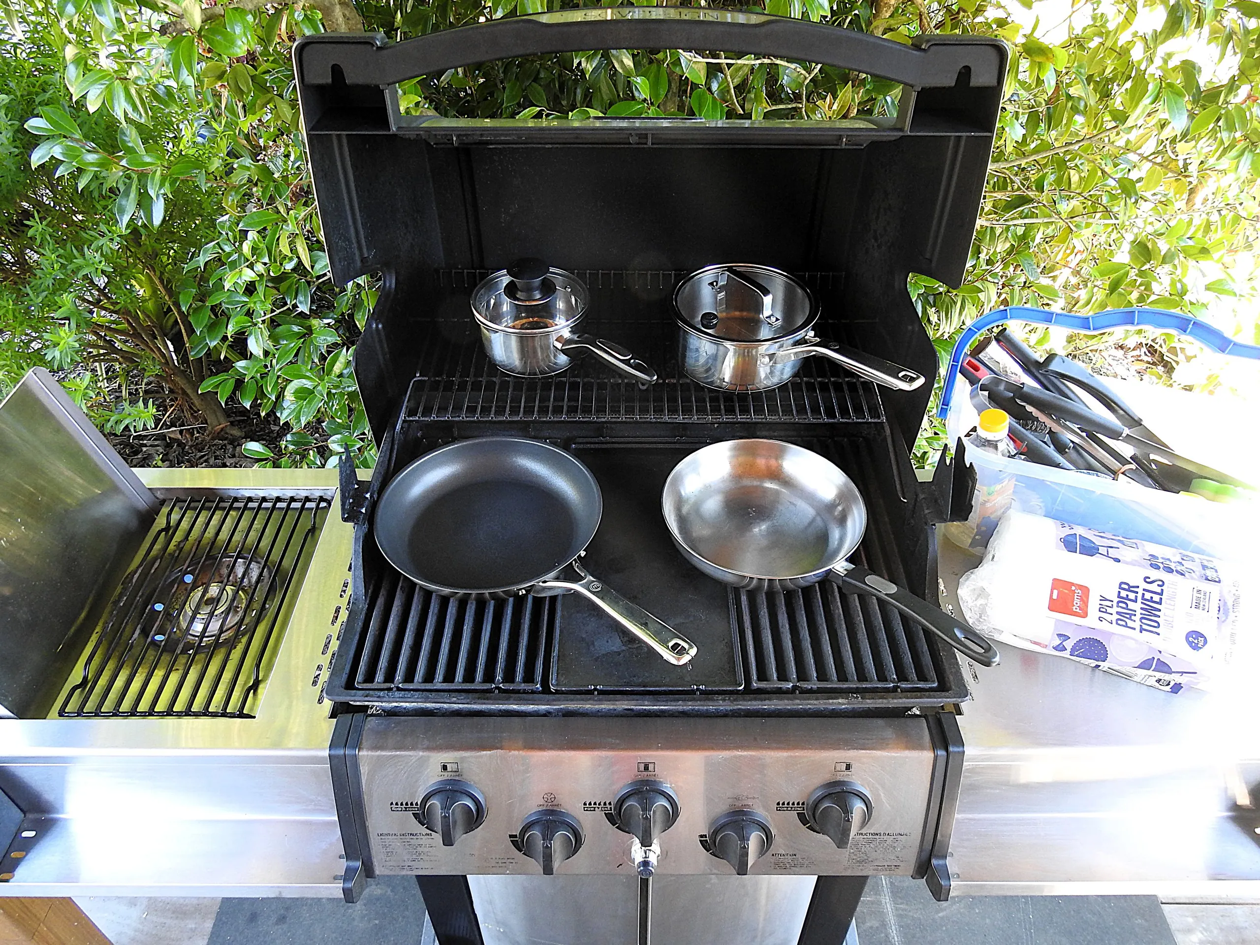 The barbecue set up for outdoor cooking on the sheltered deck