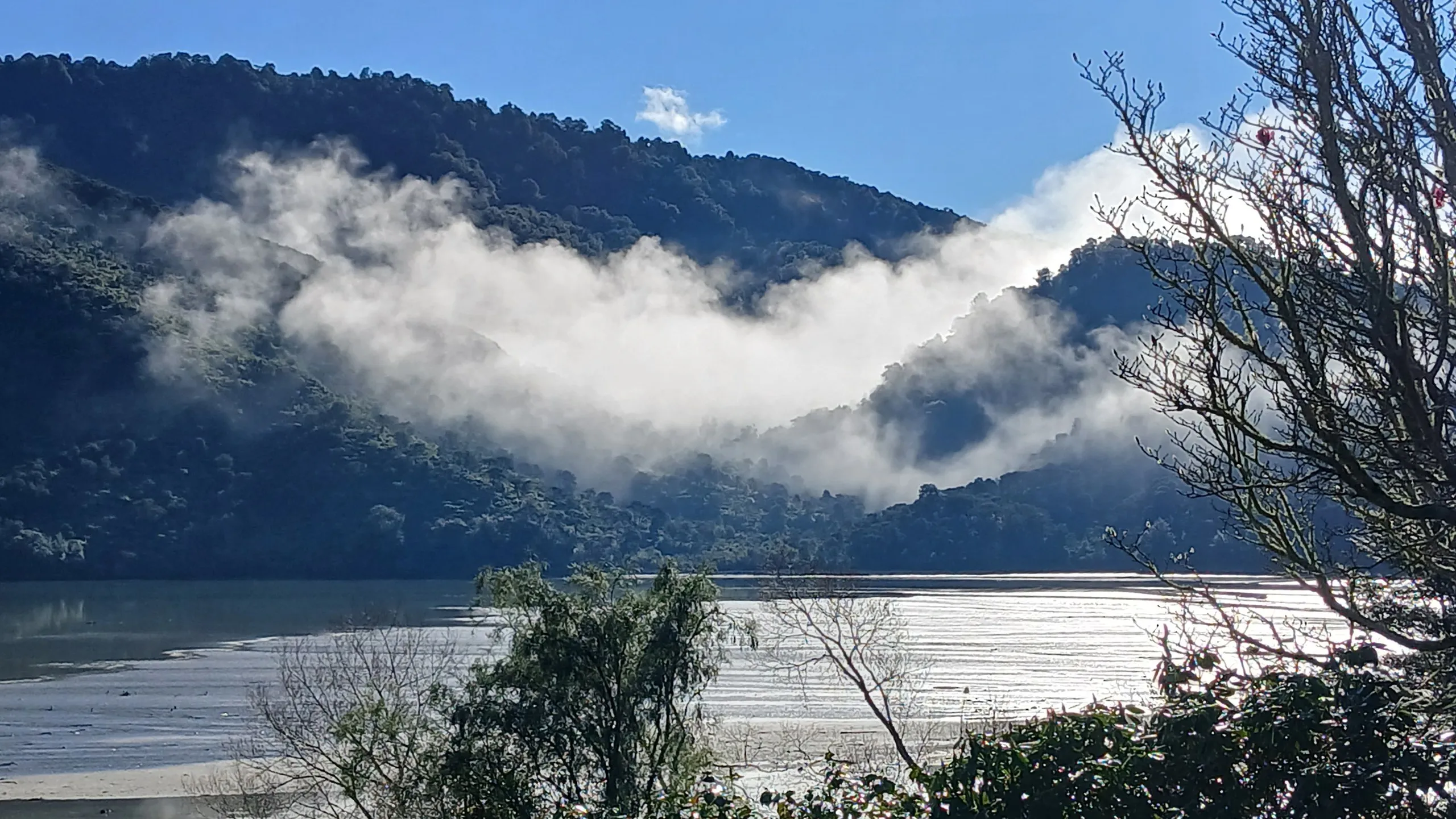 Mist lifting off the inlet on a still autumn morning