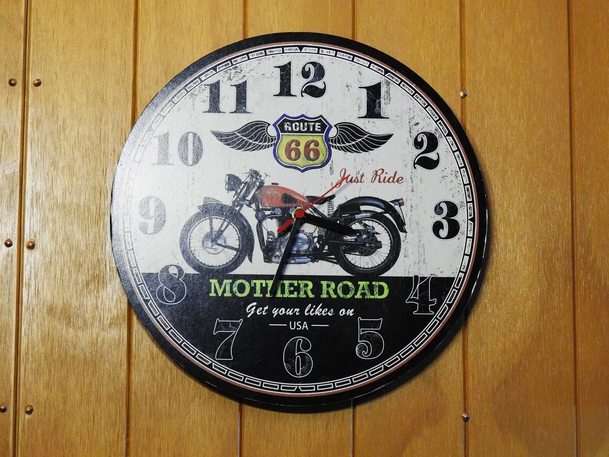A wall clock built around a motorcycle theme — one of the owner’s rider touches